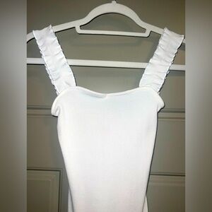 White bodysuit with ruffle straps